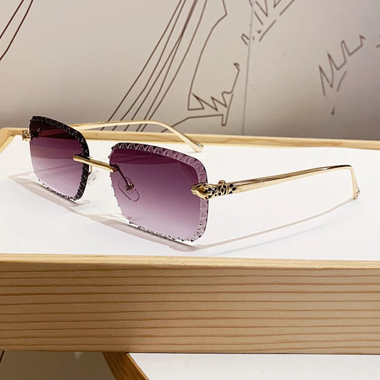 New design frameless leopard head sunglasses for driving, sun protection, fashionable metal glasses