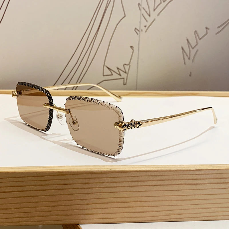 New design frameless leopard head sunglasses for driving, sun protection, fashionable metal glasses