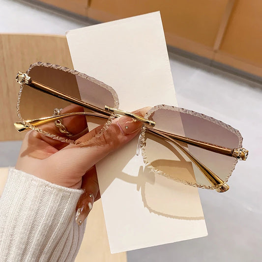 New design frameless leopard head sunglasses for driving, sun protection, fashionable metal glasses